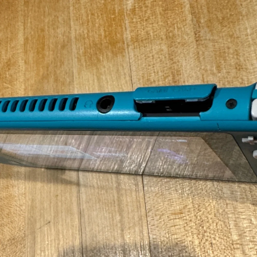 Nintendo Handheld Console - Teal as is